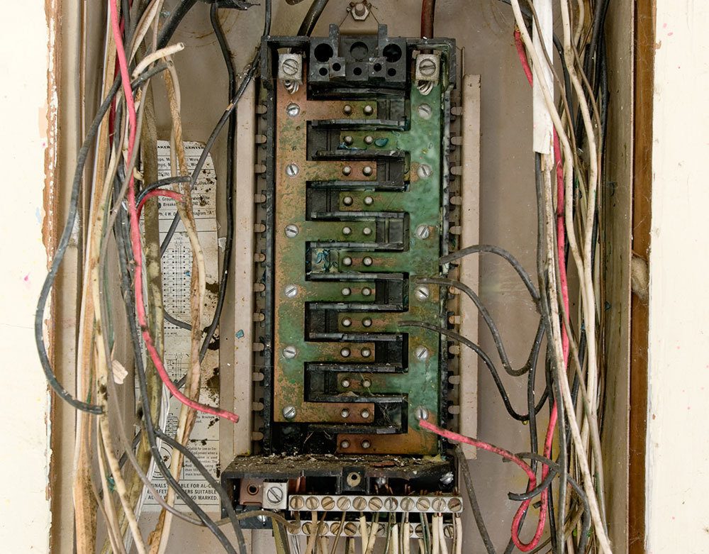 https://www.schaferelectric.com/wp-content/uploads/2015/06/old-electrical-panel.jpg