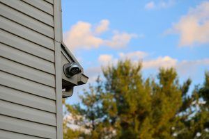 Security light on a home pointing at the yard