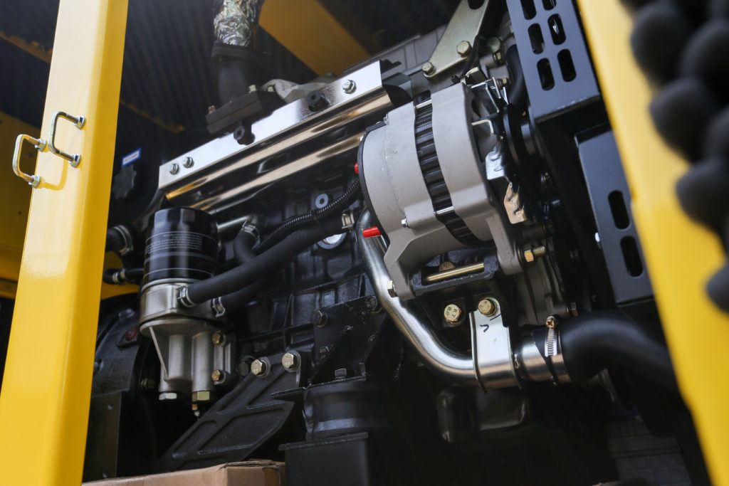Close up image of oil filter of commercial standby generator