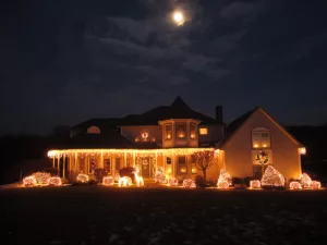 The exterior of a house lit up with christmas lights